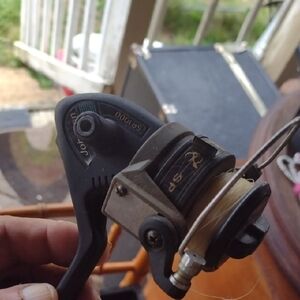 Johnson SP1000 Black and Silver Fishing Reel